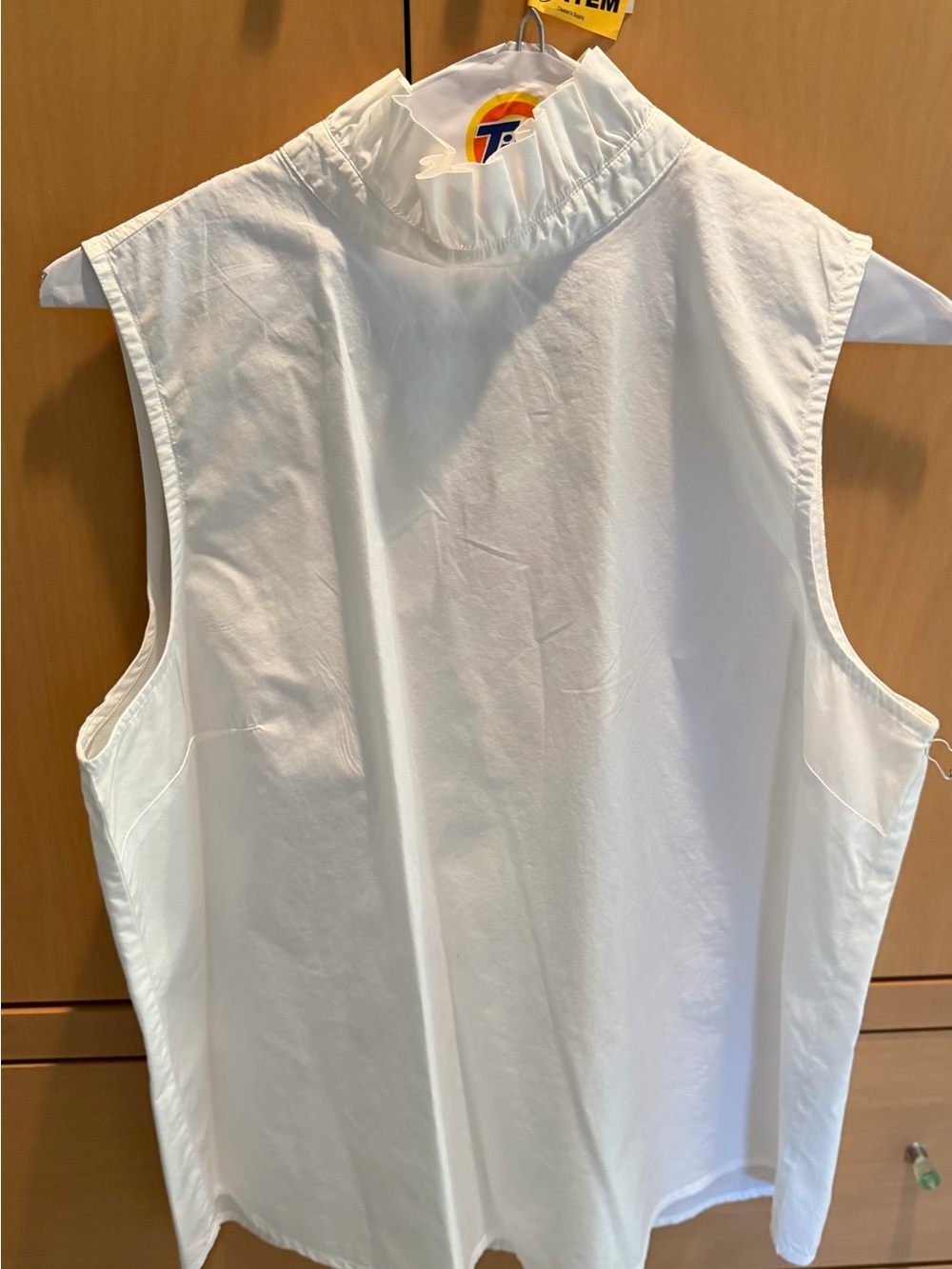 FRAME White Sleeveless Ruffled Mock Neck Top -